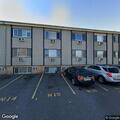 Intoxicated woman knocking on apartment window