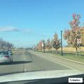 Slow-moving white SUV on Highway 61
