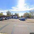 Suspicious parked vehicle at auto shop in Cornell