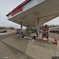 Men yelling outside closed gas station