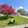 Person experiencing abdominal pain in Andover