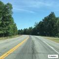 Erratic white Jeep leaves and reenters Elm Street road