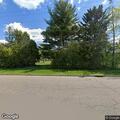 Person reporting severe back pain near Forest Lake