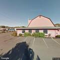 Person experiencing abdominal pain near Dundee