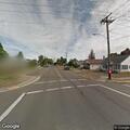 Person with severe headache near Southeast Main Street