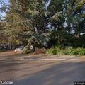 Person experiencing abdominal pain in Wilsonville