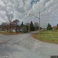 Officer checks planned brush fire at residence