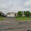 Person with severe back pain at Shoreview Circle