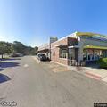 Traffic stop of black Honda near restaurant