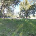 68-year-old woman possibly suffering heat stroke in park