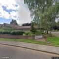Person experiencing back pain at Tigard residence