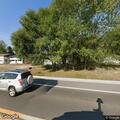 Unresponsive 69-year-old male breathing at auto shop