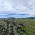 Person shouting and waving arms at Tillamook TVCC