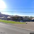 Person with back pain at residence in Damascus, Oregon