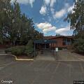 Person experiencing abdominal pain at rehab center