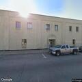 Person found unconscious with feet visible at office building