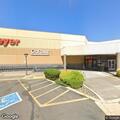 Reckless driver hits pole in store parking lot