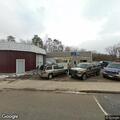 Officer with stolen vehicle at towing business