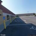 Person trying to open cars at Goodwill lot