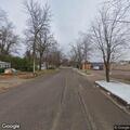 Man wandering yards and entering house on Elm Street