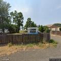 Abandoned SUV blocking driveway in Wishram