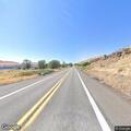 Vehicle and grass fire on State Route 14 near Wishram