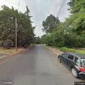 Reckless driver in white Ford Taurus near 8th Street