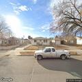 Smoke reported near parked cars in backyard