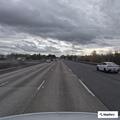 Person found lying in grass off I-5 on-ramp