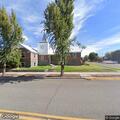 Male asleep behind wheel in church parking lot