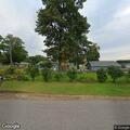 Smoking power pole near Sand Lake Road address