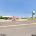 Officer checks empty vehicle at Krist gas station