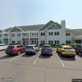 Person assisted with lift at community residence