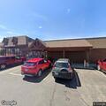 Elderly man falls and suffers head laceration outside building