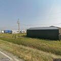 Small grass fire near homes and utility poles