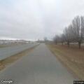 Vehicle driving without headlights on Elm Street