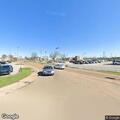 Vehicle with flat tire blocking Royal and Bacon Road
