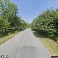 Tree blocking roadway on Route 2 near Babcock Lake