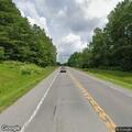 Tree blocking road on County Route 97 near NY-177