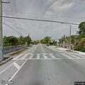 Men in dark clothing try car doors on SW 16th Street