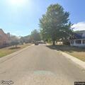 Woman trying to enter home on Banfield Avenue
