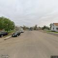 Officer checks man standing in roadway