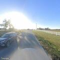 Possible stranded car on wrong side of highway