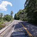 Two-vehicle crash with fluid spill on Route 212