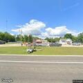 Older man with walker hitchhiking at Cut River store