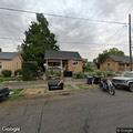 Person with breathing difficulty after fall near Malcolm Street