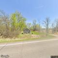 Single-vehicle rollover with driver head injury