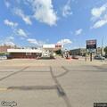 Officer assists caller near gas station bridge