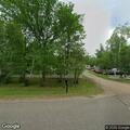 Person reported in yard wearing dark coat