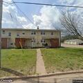Low-hanging utility line reported on Commando Street
